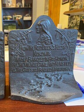 Antique Pair Native American cast-iron book ends. Hiawatha poem by Longfellow.